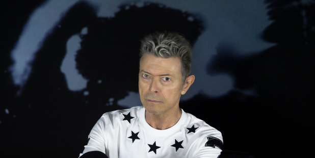 Bowie poses late last year for a promotional