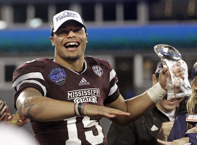 Mississippi State quarterback Dak Prescott celebrates after Mississippi State won the Belk Bowl NCAA college football game against North Carolina State