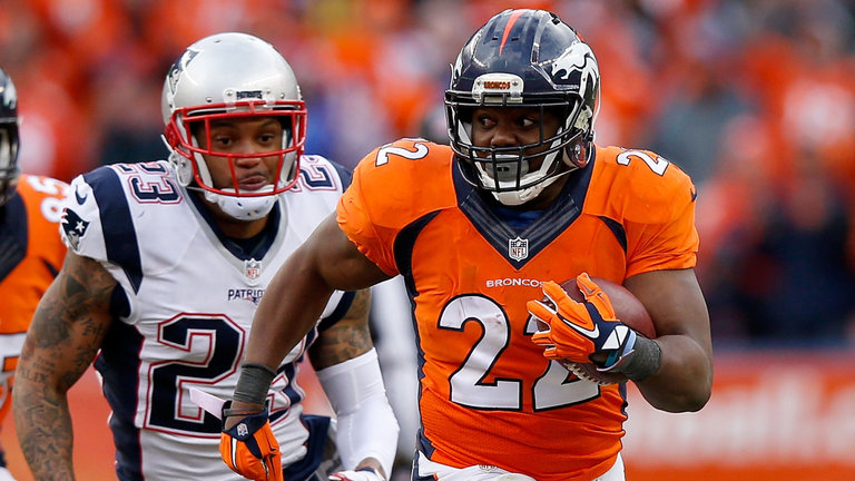 C.J. Anderson #22 of the Denver Broncos runs with the ball in the second half against the New England Patriots