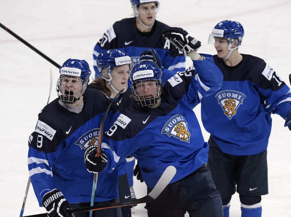 Finland's Patrik Laine Jesse Puljujärvi Sami Niku Sebastian Aho and Vili Saarijarvi celebrate one of Laine's two goals during Saturday's quarter-final victory over Canada