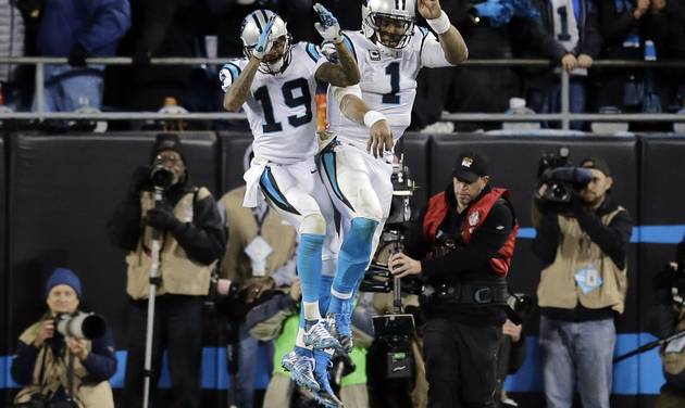 Carolina Panthers&#039 Cam Newton celebrates his touchdown run with Ted Ginn during the second half the NFL football NFC Championship game against the Arizona Cardinals Sunday Jan. 24 2016 in Charlotte N.C