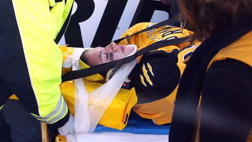 FOXBORO MA- DECEMBER 31 Denna Laing #24 of the Boston Pride is taken off the ice following an injury against the Les Canadiennes during the Outdoor Womens Classic at Gillette Stadium