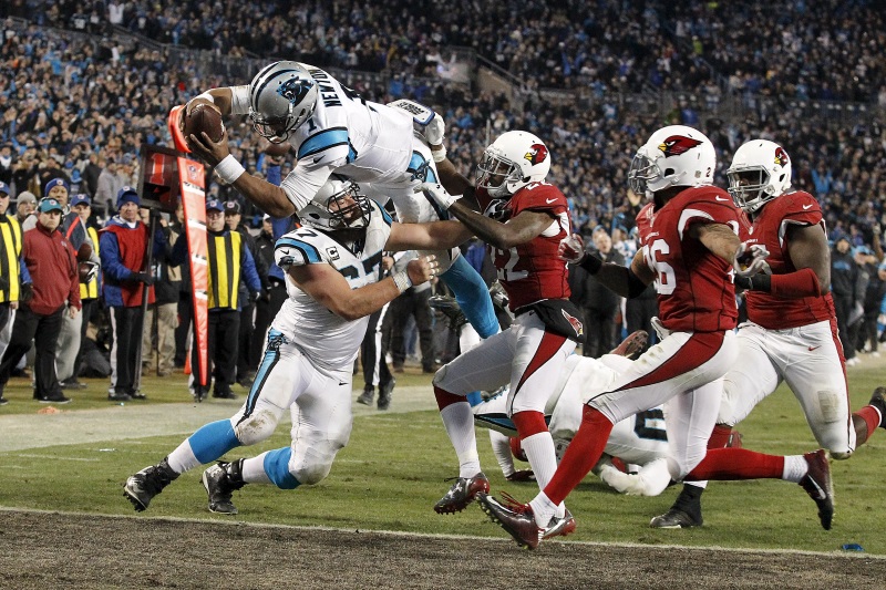 Carolina Panthers quarterback Cam Newton dives for a touchdown in their win over the Arizona Cardinals