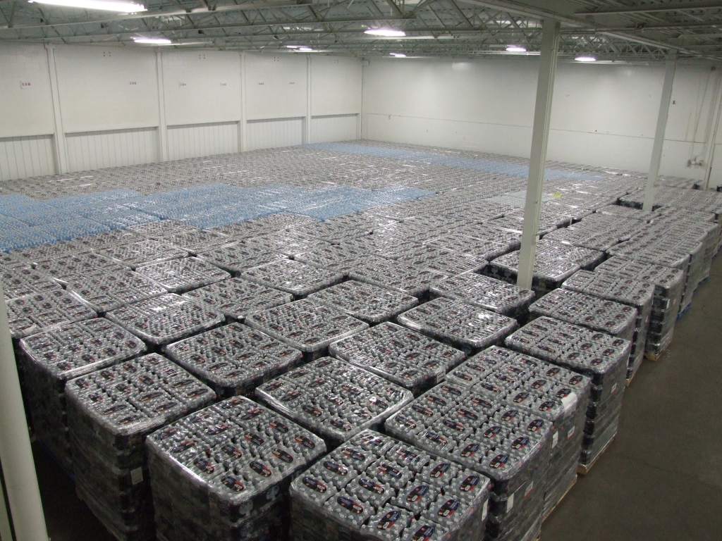 Cases of bottled water await distribution in Flint