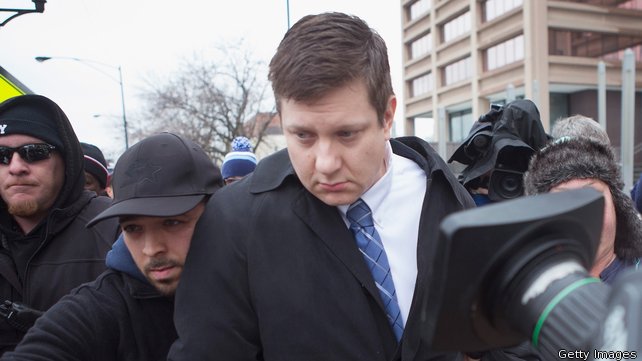 Chicago police officer Jason Van Dyke leaves court after pleading not guilty to first-degree murder