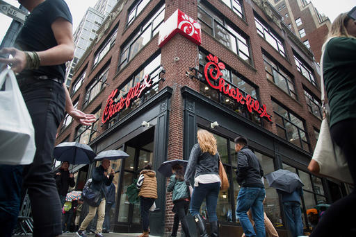 Pedestrians walk past a Chick-fil-A restaurant in New York N.Y. on Oct. 2 2015