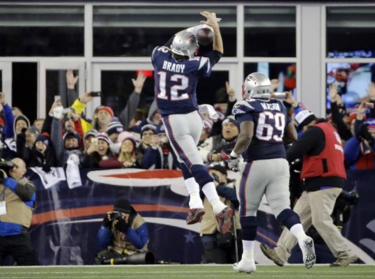 New England Patriots quarterback Tom Brady celebrates