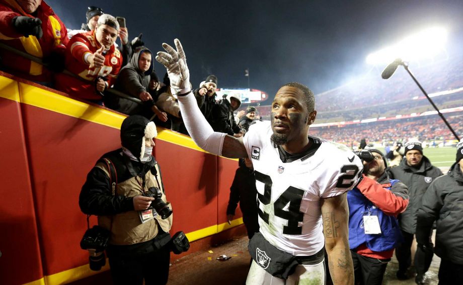 Oakland Raiders free safety Charles Woodson waves to fans as he walks off the field after an NFL football game against the Kansas City Chiefs Sunday Jan. 3 2016 in Kansas City Mo. The Chiefs won 23-17