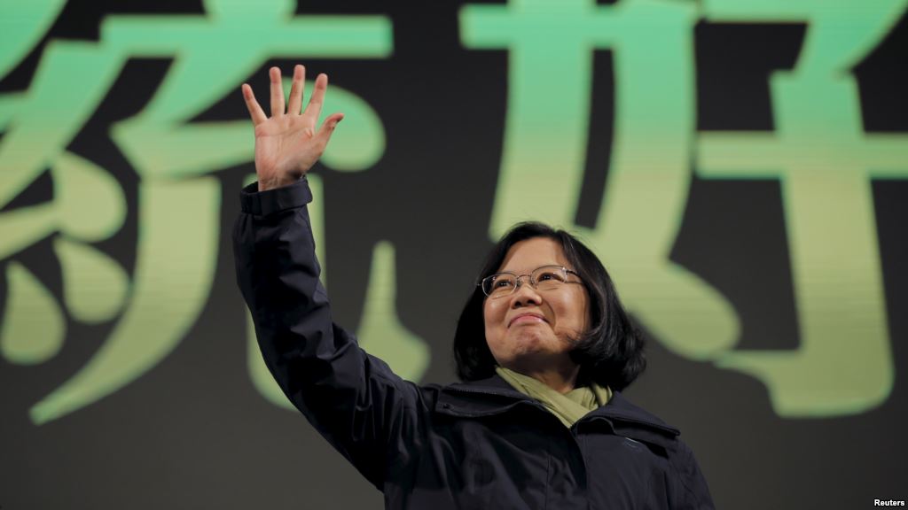 Democratic Progressive Party Chairperson and presidential candidate Tsai Ing-wen waves to her supporters after her election victory at party headquarters in Taipei Taiwan Jan. 16 2016