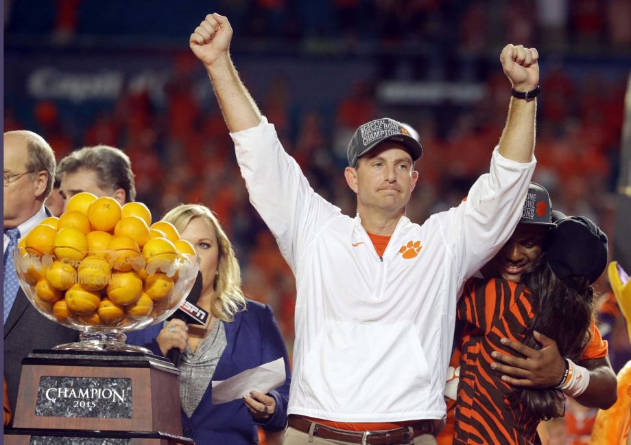 Clemson head coach Dabo Swinney raises his arms after winning the Orange Bowl NCAA college football semifinal playoff game against Oklahoma Thursday Dec. 31 2015 in Miami Gardens Fla. Clemson defeated Oklahoma 37-17 to advance to the championship gam