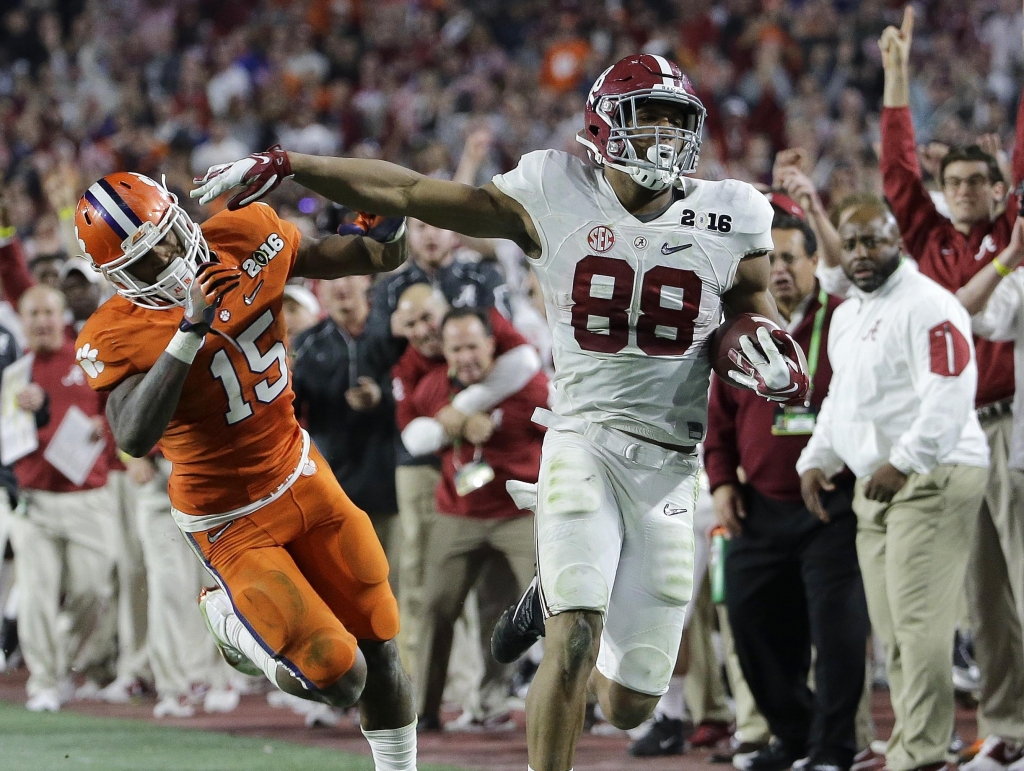 Clemson's T.J. Green knocks Alabama's O.J. Howard out of bounds at the end of a 63-yard pass play that set up a crucial touchdown