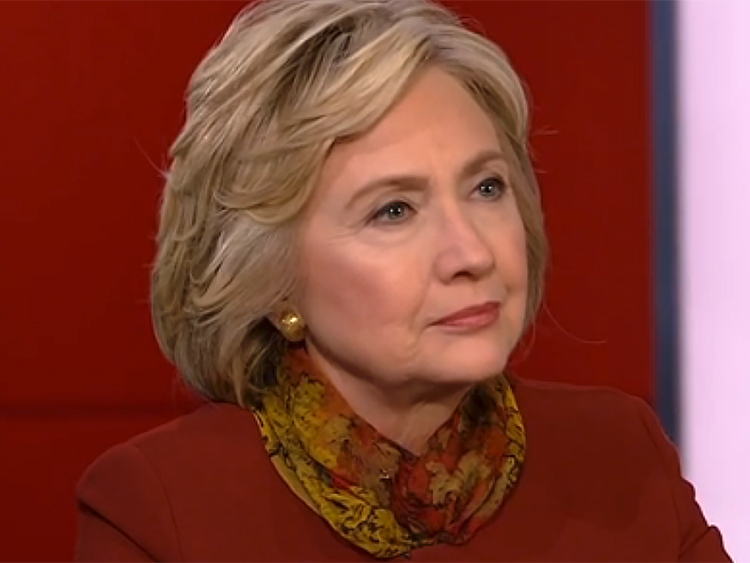 Clinton cries foul over Sanders TV ad on Wall Street