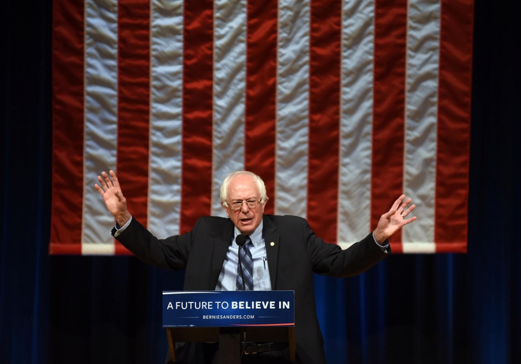 Credit Faith Ninivaggi        LOCK AND LOAD Bernie Sanders addresses the crowd at the Timberlane Performing Arts Center in Plaistow N.H. yesterday