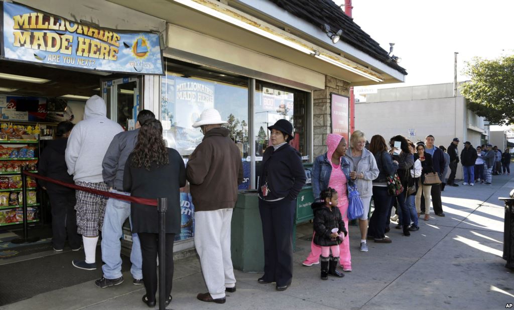 Customers wait in line to buy Powerball lottery tickets in Hawthorne Calif. on Jan. 8 2016