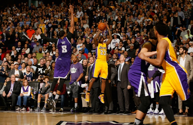 Getty Images  AFP  Ezra Shaw Louis Williams of the Los Angeles Lakers goes up for a shot at the buzzer against Rudy Gay of the Sacramento Kings in Sacramento California