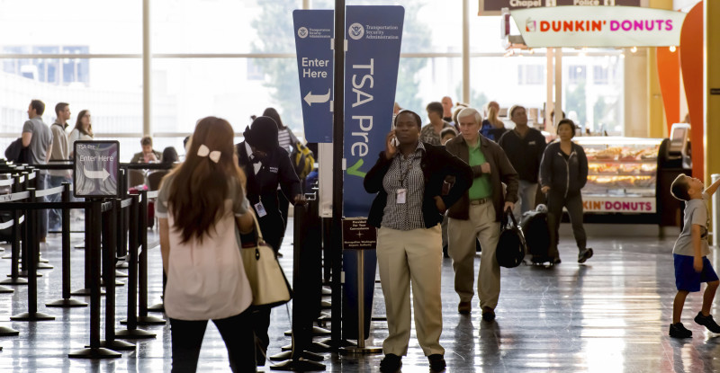 DCA Reagan National Airport Washington DC- Passengers in the TSA line in an airport