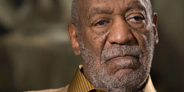 Bill Cosby is charged with sexually assaulting a woman