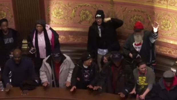 Demonstrators in Michigan Capitol building protesting against Gov. Rick Snyder over the water crisis in Flint