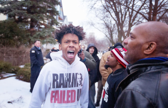 Demonstrators protest outside of Mayor Rahm Emanuel’s home in Chicago Illinois on Tuesday. — AFP