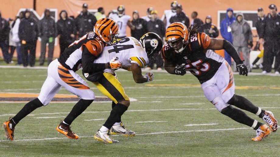 Cincinnati Bengals Vontaze Burfict, right runs into Pittsburgh Steelers Antonio Brown during the second half of an NFL wild-card playoff football game in Cincinnati. Burfict was called for a penalty