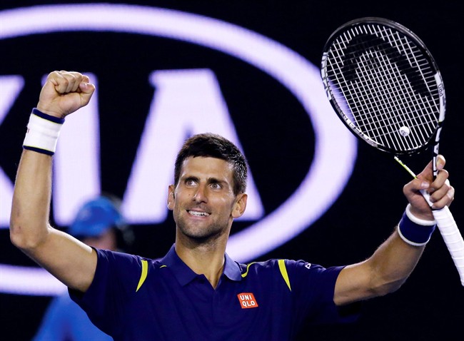 Novak Djokovic of Serbia celebrates after defeating Kei Nishikori of Japan in their quarterfinal match at the Australian Open tennis championships in Melbourne Australia Tuesday Jan. 26 2016