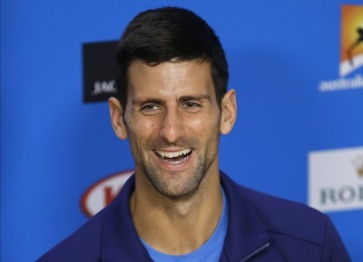 Ruthless Djokovic thrashes Federer to reach sixth Australian Open final