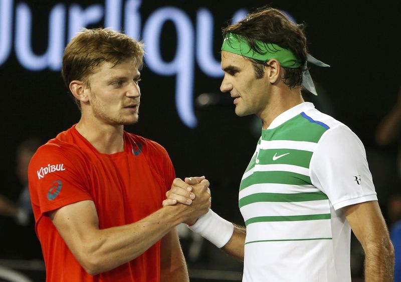 Switzerland's Roger Federer shakes hands with Belgium's David Goffin after Federer won their fourth round match at the Australian Open tennis tournament at Melbourne Park Australia. – Reuters pic