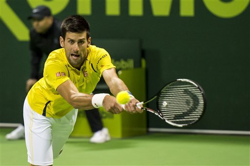 Serbia's Novak Djokovic returns the ball during a match against Leonardo Mayer of Argentina at Qatar Open Tennis tournament Thursday Jan. 7 2016 in Doha Qatar