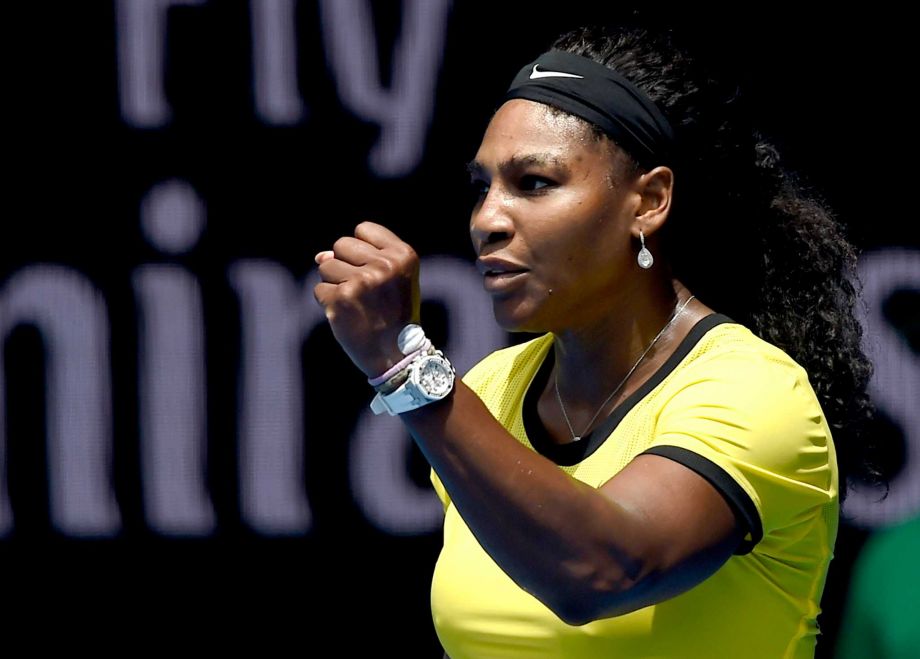 Serena Williams of the United States celebrates after winning a point against Maria Sharapova of Russia during their quarterfinal match at the Australian Open tennis championships in Melbourne Australia Tuesday Jan. 26 2016