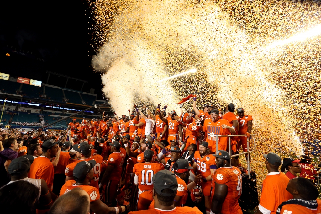 MIAMI GARDENS FL- DECEMBER 31 Clemson Tigers players celebrate defeating the Oklahoma Sooners with a score of 37 to 17 to win the 2015 Capital One Orange Bowl at Sun Life Stadium