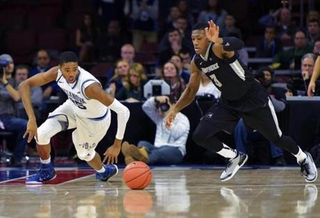 Villanova’s Mikal Bridges and Providence’s Kris Dunn scrambled for a loose ball