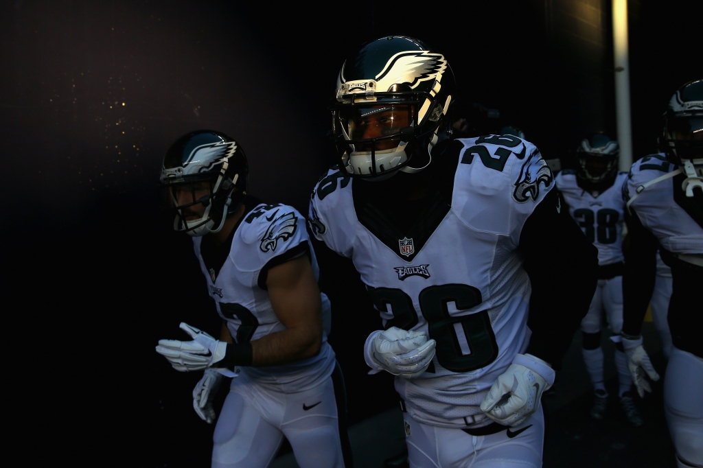 FOXBORO MA- DECEMBER 06 Chris Maragos #42 and Walter Thurmond #26 of the Philadelphia Eagles run onto the field prior to the game against the New England Patriots at Gillette Stadium