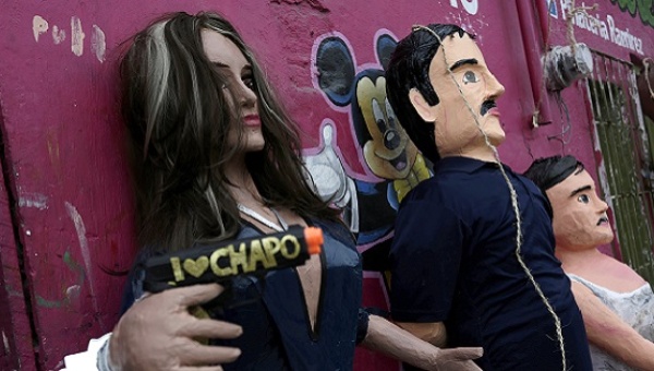 Piñatas depicting Mexican actress Kate del Castillo and the drug lord Joaquin'El Chapo Guzman are displayed in Tamaulipas state Mexico Jan. 13 2016