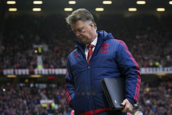 Manchester United's manager Louis van Gaal takes