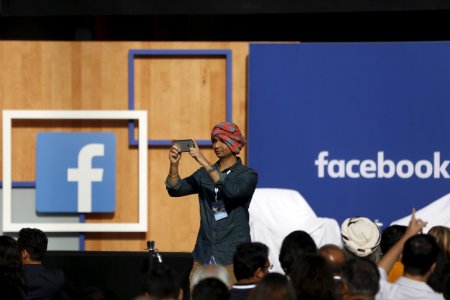 Minister Narendra Modi arrives for a town hall at Facebook's headquarters in Menlo Park California