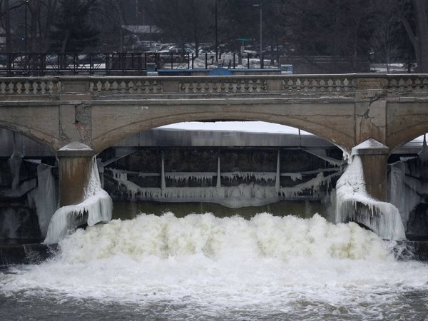 The Flint River is shown near downtown Flint Mich. Thursday Jan. 21 2016. Residents in the former auto-making hub â€” a poor largely minority city â€” feel their complaints about lead-tainted water flowing through their taps have been slig