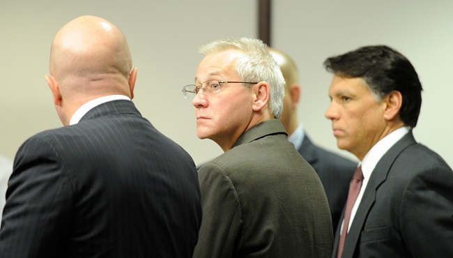 Oscar Ray Bolin Jr. center watches as the jurors walk into the courtroom in Tampa. Bolin Jr, who has been convicted 10 times for three separate slayings is scheduled to die for one of them on Thurs