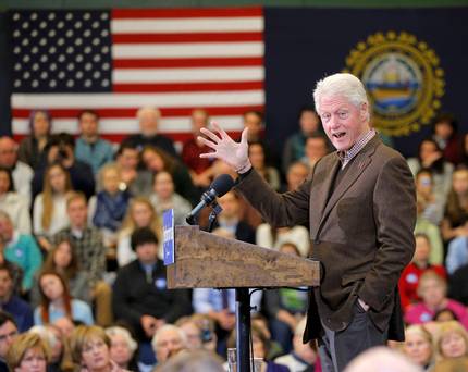 Former US President Bill Clinton addresses a campaign rally for his wife Democratic presidential candidate Hillary Clinton in Nashua New Hampshire