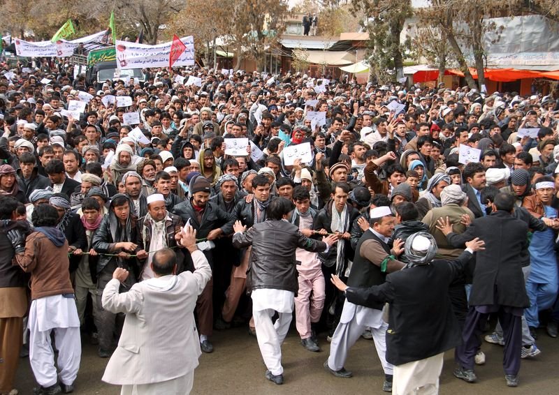 Afghan men protest to condemn the killing of seven Hazara ethnic minority that were kidnapped and killed by Islamic State militants in Ghazni province Afghanistan