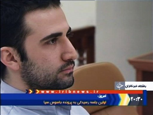 FILE- In this Tuesday Dec. 27 2011 video frame grab image made from the Iranian broadcaster IRIB TV U.S. citizen Amir Mirzaei Hekmati accused by Iran of spying for the CIA sits in Tehran's revolutionary court in Iran. Iran state television has repo