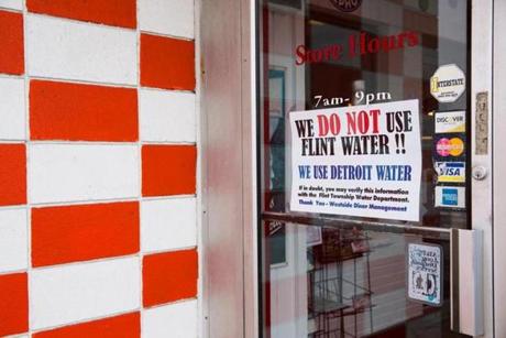 A sign at a Flint Mich. restaurant told customers Wednesday it does not use city water