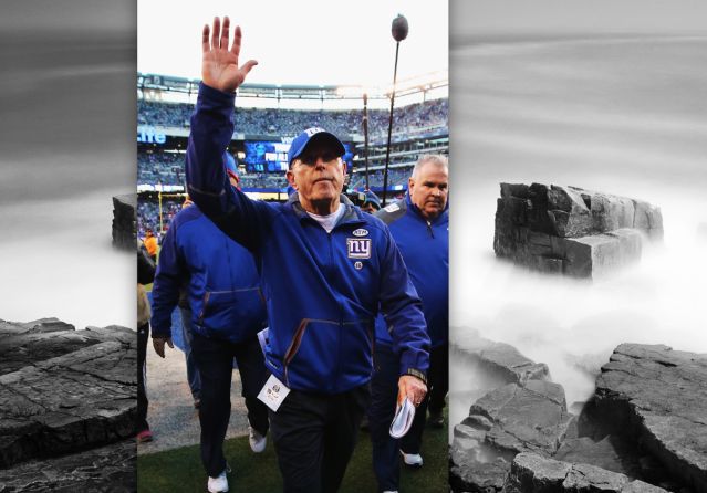 Giants head coach Tom Coughlin waves to fans while exiting the field Sunday at MetLife