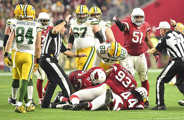 After slow start, Rodgers, Packers overwhelm Redskins 35-18