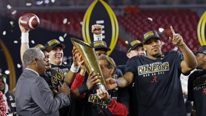 Alabama head coach Nick Saban and players celebrate after the NCAA college football playoff championship game against Clemson Monday Jan. 11 2016 in Glendale Ariz. Alabama won 45-40. MARICOPA COUNTY OUT