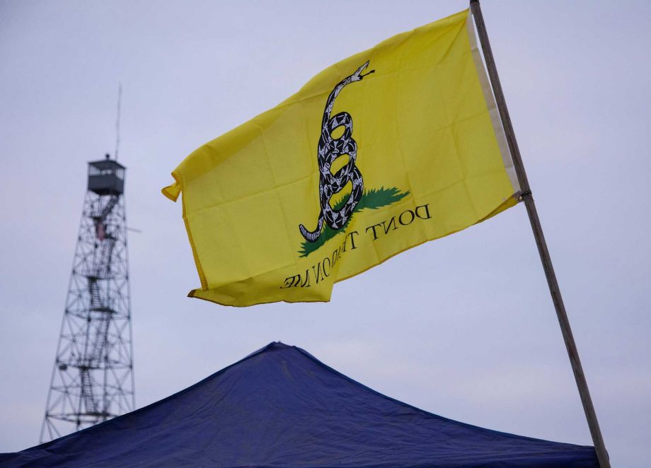 A'Don't Tread on Me flag at the Malheur National Wildlife Refuge entrance﻿ where armed men continue to occupy a federal wildlife refuge despite locals calls for them to leave the area