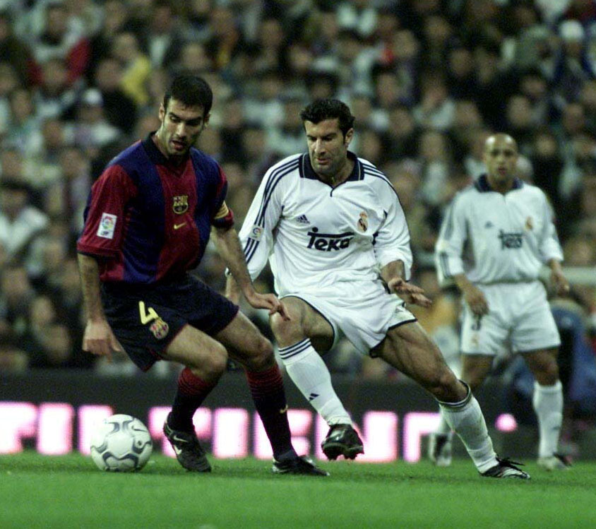 3 Mar 2001 Josep Guardiola of Bacelona turns away from Lusi Figo of Real Madrid during the Real Madrid v FC Barcelona La Liga match played at the Santiago Bernabeau Madrid. Mandatory Credit Firo