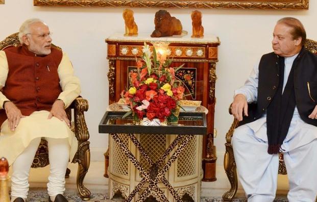 Minister Narendra Modi talking with his Pakistani counterpart Nawaz Sharif in Lahore Pakistan on 25 December 2015