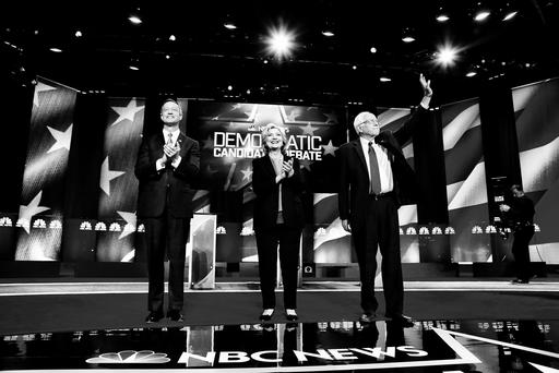 Democratic presidential candidates Gov. Martin O'Malley Hillary Clinton and Sen. Bernie Sanders stand together before the start of the NBC You Tube Democratic presidential debate on Jan. 17 2016 in Charleston S.C