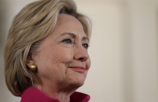 Democratic presidential candidate Hillary Clinton listens during a town hall style campaign event Tuesday Dec. 29 2015 at South Church in Portsmouth N.H