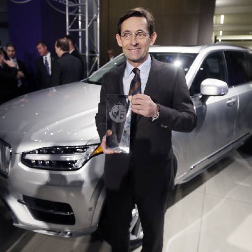 USA Senior Vice President Americas President and CEO Lex Kerssemakers stands next to the Volvo XC90 after winning the truck  utility of the year at the North American International Auto Show Monday Jan. 11 2016 in Detroit. (AP